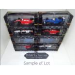 Onyx - 24 diecast model F1 racing cars with driver figures in rigid transparent cases,