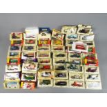 Lledo and Others - 57 boxed diecast model vehicles predominately by Lledo.