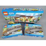 Lego - Three boxed Lego sets. Lot comprises 2x Lego City #7499, together with Lego City #60050.