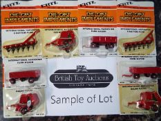 ERTL - approximately 24 diecast 1:64 scale model farm implements, wagons,
