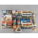 Lledo, Corgi, Matchbox, Cararama - Over 20 boxed diecast vehicles in various scales.