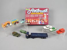 Dinky, Revell, Matchbox, Corgi, Tekno - A collection of seven unboxed diecast vehicles,
