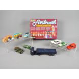 Dinky, Revell, Matchbox, Corgi, Tekno - A collection of seven unboxed diecast vehicles,