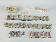 Britains and Others - In excess of 30 unboxed Britains and predominately unmarked metal soldiers.