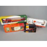 IXO, Peterbilt, Cararma, Corgi - Four boxed diecast model trucks in 1:50 and 1:64 scales.