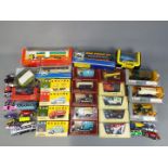 Matchbox, Corgi, Vanguards Tomica and Others - 23 boxed diecast vehicles in several scales,