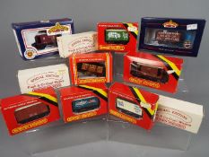 Hornby, Bachmann - 11 boxed items of OO gauge rolling stock.