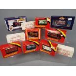 Hornby, Bachmann - 11 boxed items of OO gauge rolling stock.