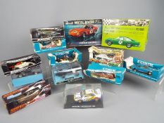 Scalextric, Revell - A collection of 13 boxed slot cars predominately by Scalextric.