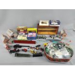 Atlas, Solido, Lledo and others - A mixed lot containing diecast and model railway parts,