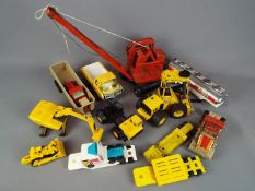 Triang, Tonka - An unboxed Triang Jones KL44 crane with a small collection of unboxed Tonka toys.