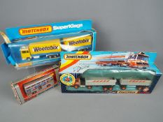 Matchbox, Dinky - Three boxed diecast vehicles.