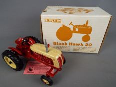 Ertl - A boxed diecast 1:16 #4139PA Black Hawk 20 tractor from Ertl's National Farm Toy Museum