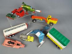 Dinky Toys - A group of seven unboxed diecast vehicles and parts by Dinky.