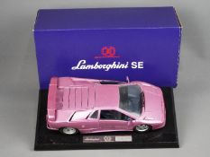Gwilo - A boxed Special Edition diecast 1:18 scale Lamborghini SE in metallic pink by Gwilo.