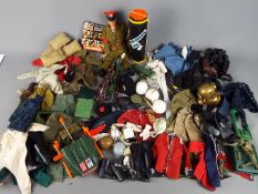 Palitoy - An unboxed vintage 'Talking' Action Man figure together with a large quantity of unboxed
