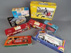 Corgi, Siku - Eight boxed diecast vehicles in various scales.