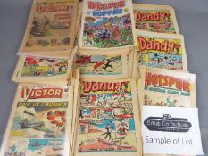 A collection of vintage comics including Dandy, Beano, Beezer,