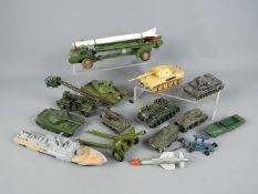 Dinky Toys, Corgi Toys, Solido - Approximately 12 unboxed military vehicles.