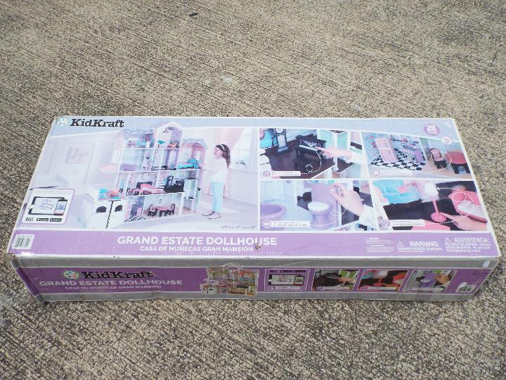 KidKraft - A boxed factory sealed Grand Estate Dollhouse by KidKraft.