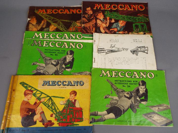 Meccano - A vintage Meccano set 7A presented in a red wooden box on castors with a lift off lid and - Image 7 of 9