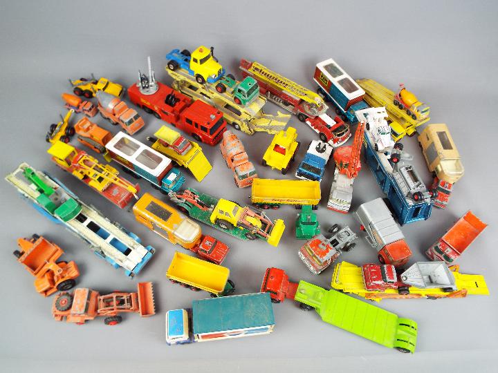 Corgi, Matchbox - Over 30 unboxed predominately diecast commercial vehicles in various scales.