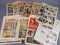 A collection of vintage comics, predominantly 1950's to include Eagle, Wizard, Lion,