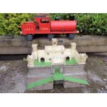 A red wooden push-along Locomotive, 74 cm (length), a model Fort,