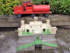 A red wooden push-along Locomotive, 74 cm (length), a model Fort,