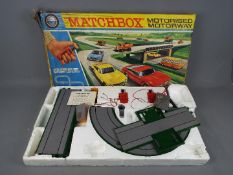 Matchbox - A boxed Matchbox Motorised Motorway Set in Playworn condition.