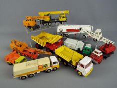 Dinky Toys - A fleet of 10 unboxed diecast commercial vehicles by Dinky Toys.