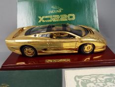 Gwilo - A boxed Gwilo 1:18 scale Jaguar XJ220.