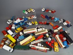 Corgi, Matchbox and Others - In excess of 60 unboxed diecast model vehicles in various scales.