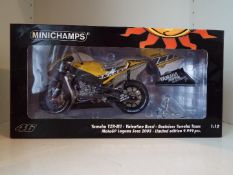 Minichamps Valentino Rossi Collection - a 1:12 scale diecast model Yamaha YZR-M1,