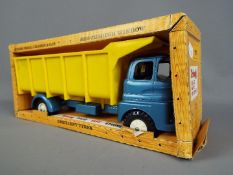 Triang - A boxed Triang Jumbo Austin Tipper.