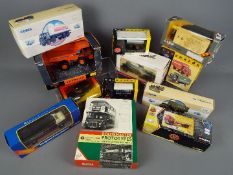 Corgi, Vanguards, Ertl - 12 boxed diecast vehicles in a variety of scales.