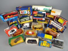 Corgi Toys and Others - In excess of 20 boxed diecast model vehicles in various scales.