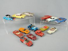 Corgi, Dinky Toys - 14 unboxed diecast model cars.