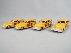 Dinky Toys - A scarce Dinky Toys Trade Box containing four examples of 27F Plymouth Estate Car.