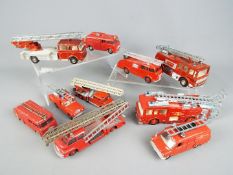 Dinky Toys - A collection of 10 unboxed diecast model fire appliances by Dinky Toys.