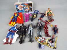 A collection of mixed action figures and a case of nine Bakugan Battle Brawlers.