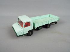 French Dinky Toys - An unboxed French Dinky #569 Berliet Stradair Openback Tipping Truck.