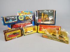 Corgi, Matchbox, Dinky Toys - A collection of eight boxed diecast vehicles.