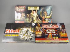 Parker, Hasbro - Three boxed collectable Star Wars themed games.