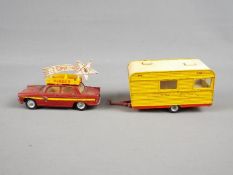 French Dinky Toys - An unboxed French Dinky #882 "Pinder" Gift Set The Lot consists of Peugeot 404