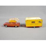 French Dinky Toys - An unboxed French Dinky #882 "Pinder" Gift Set The Lot consists of Peugeot 404