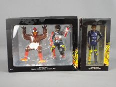 Minichamps Valentino Rossi Collection - two 1:12 scale diecast figures depicting Valentino Rossi,