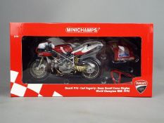 Minichamps - a 1:12 scale diecast model Ducati 916, Carl Fogarty, Team Ducati Corse Virgino,