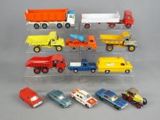 Dinky Toys - An unboxed collection of 13 diecast Dinky Toys.