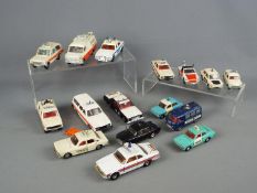 Dinky Toys, Corgi Toys - A collection of 16 unboxed diecast Police vehicles.